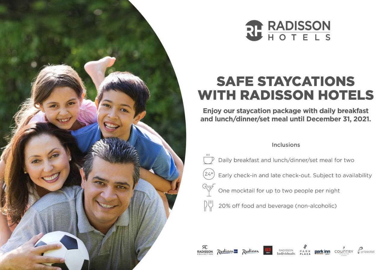Radisson Mumbai Andheri Midc ภายนอก รูปภาพ A Radisson Hotels advertisement